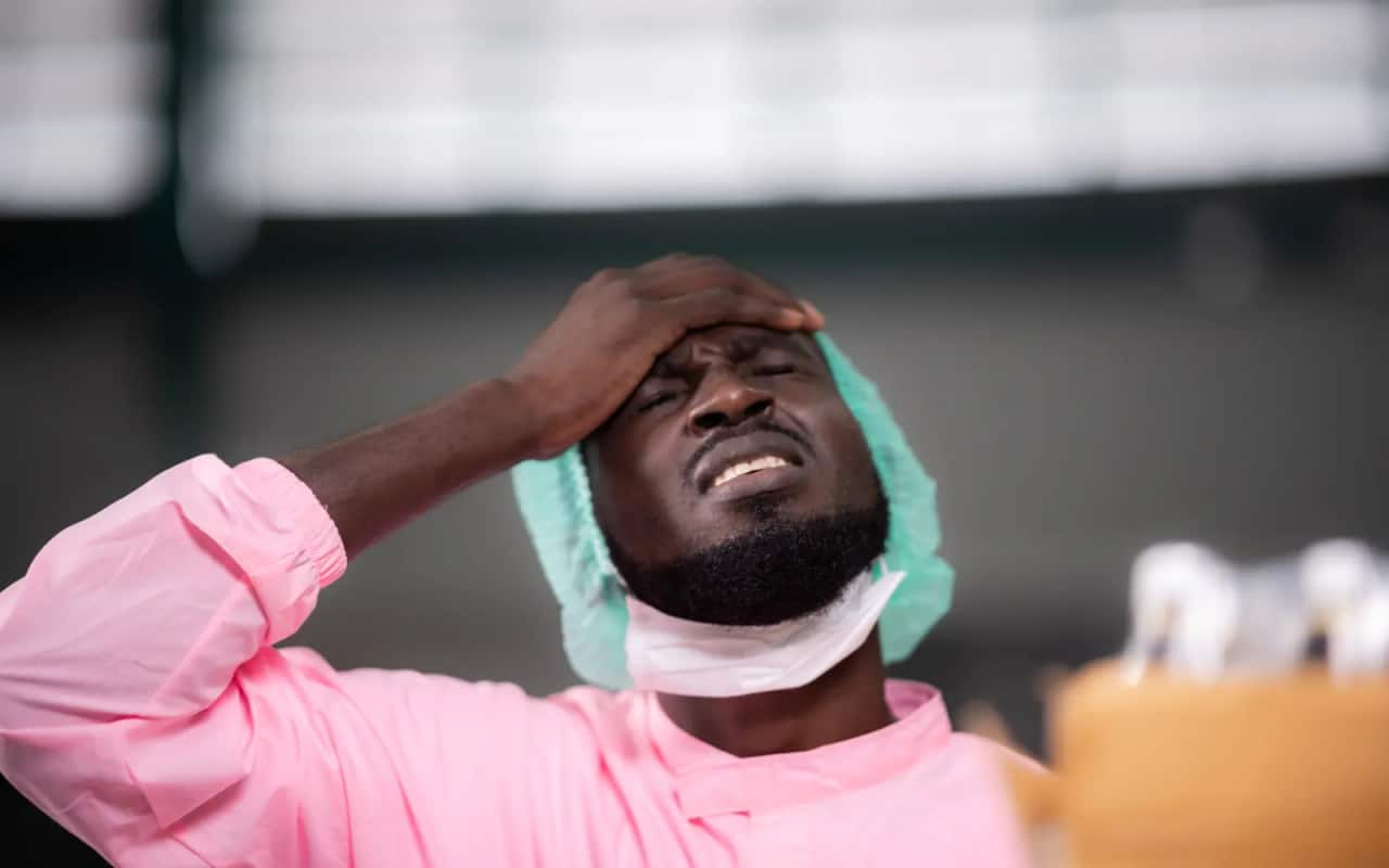 Stressed artisan facing work uncertainty